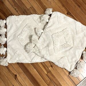 2 H&M Home tasseled beige cushion covers